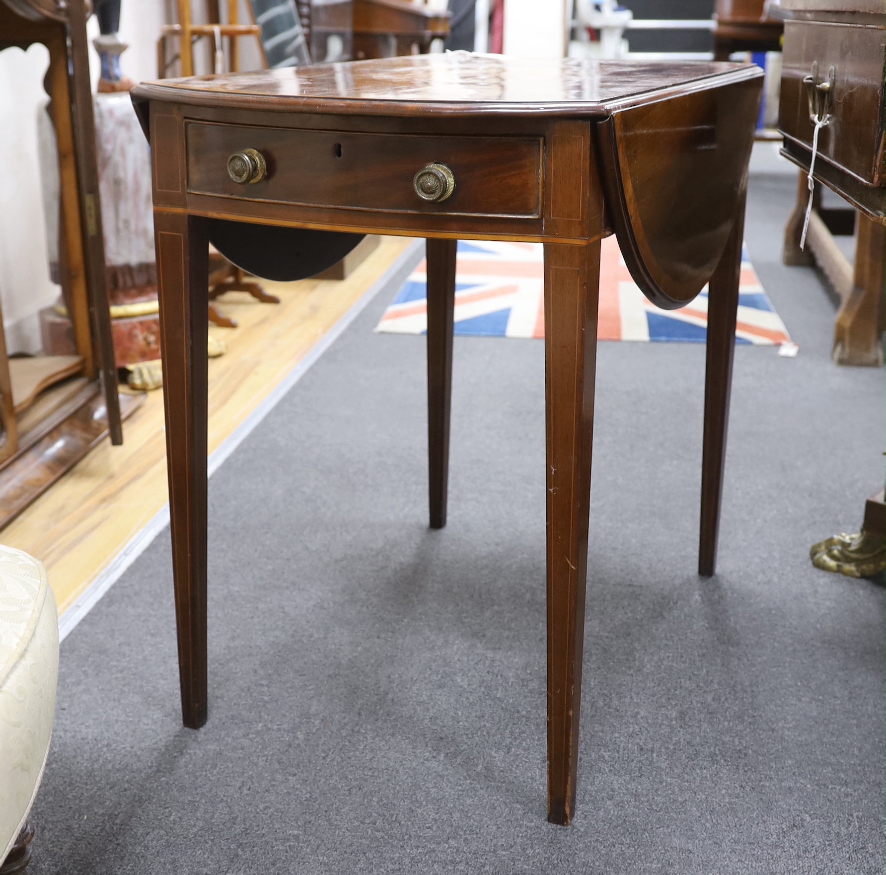 A George III banded mahogany and marquetry inlaid oval Pembroke table, width 75cm, depth 46cm, height 69cm